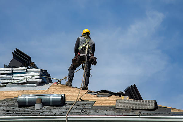 Professional Gutter Installation technician working in Henderson, IL